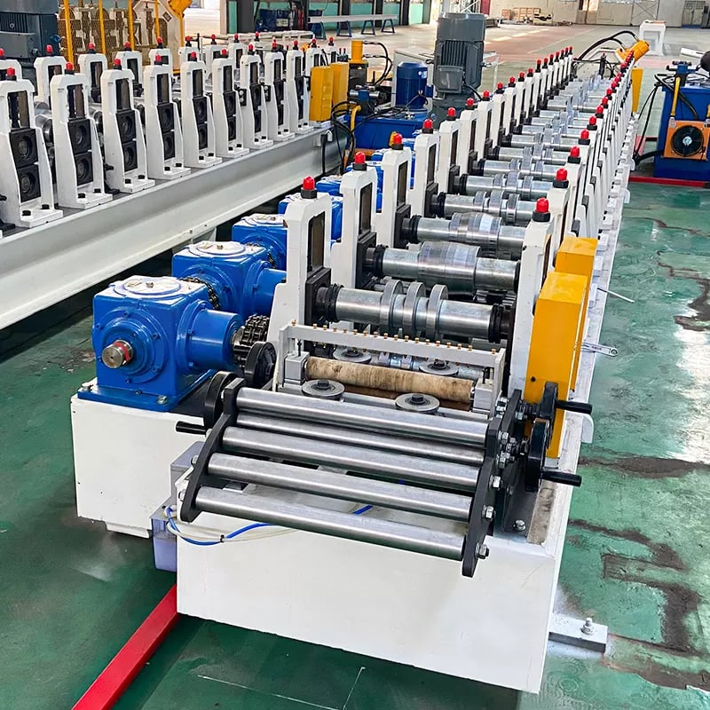 Close-up of forming rollers and shafts